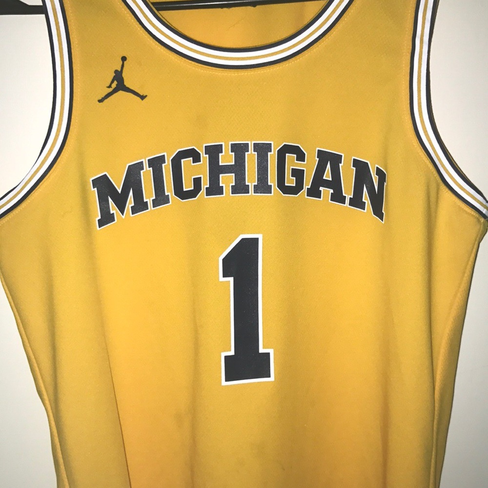 Boys brand new size medium NBA Michigan jersey